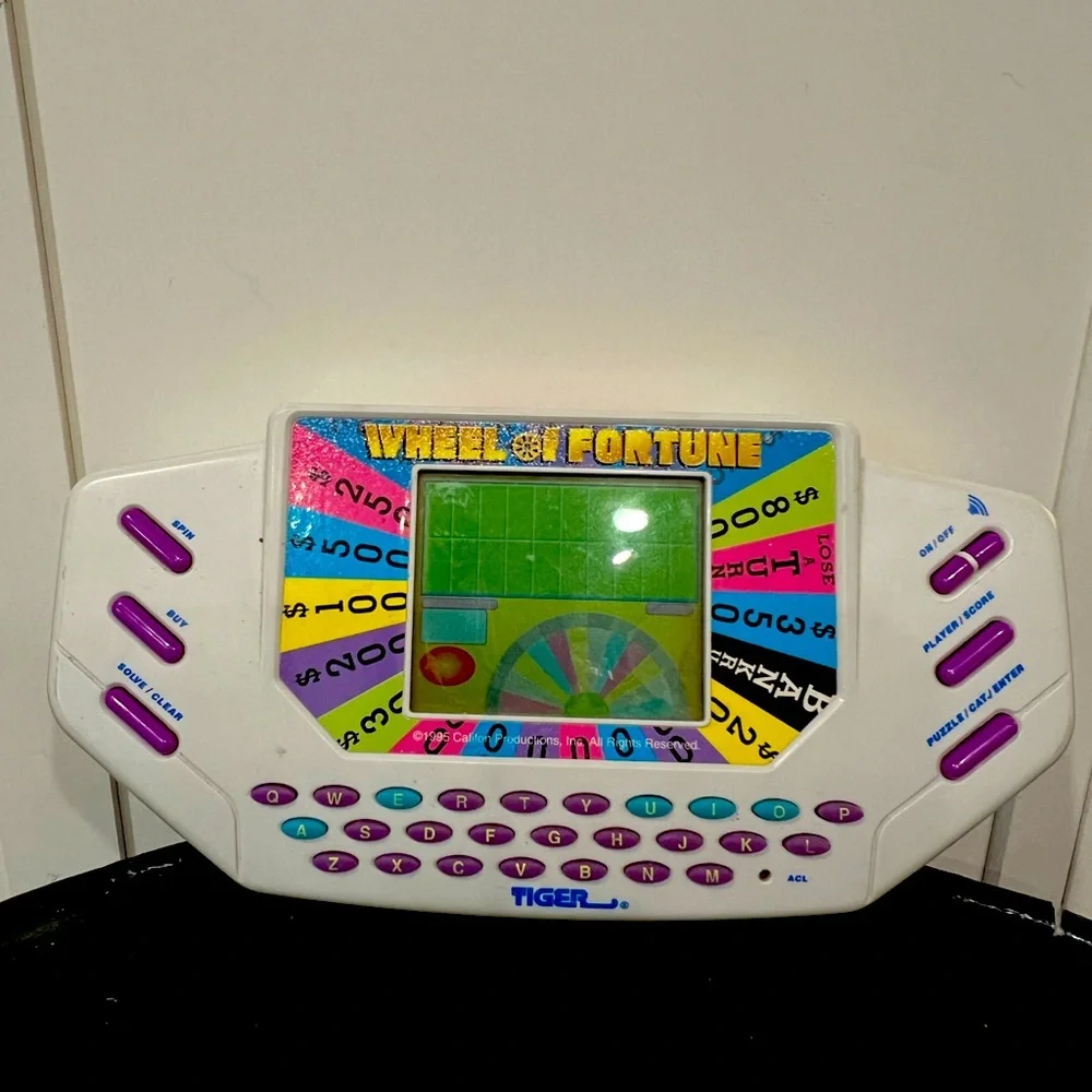 Tiger Electronics Wheel of Fortune Handheld Video Game - EUC